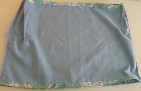 Inside out, to show lining.